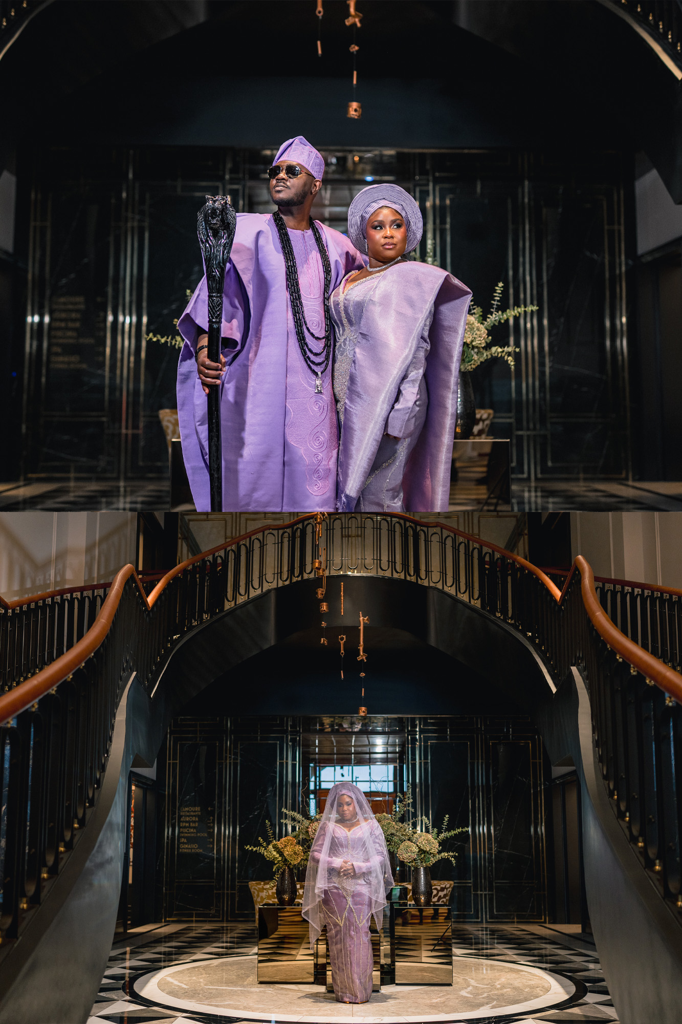 A couple dressed in matching lavender traditional outfits stands on a grand staircase in a stylish, dark-lit interior.